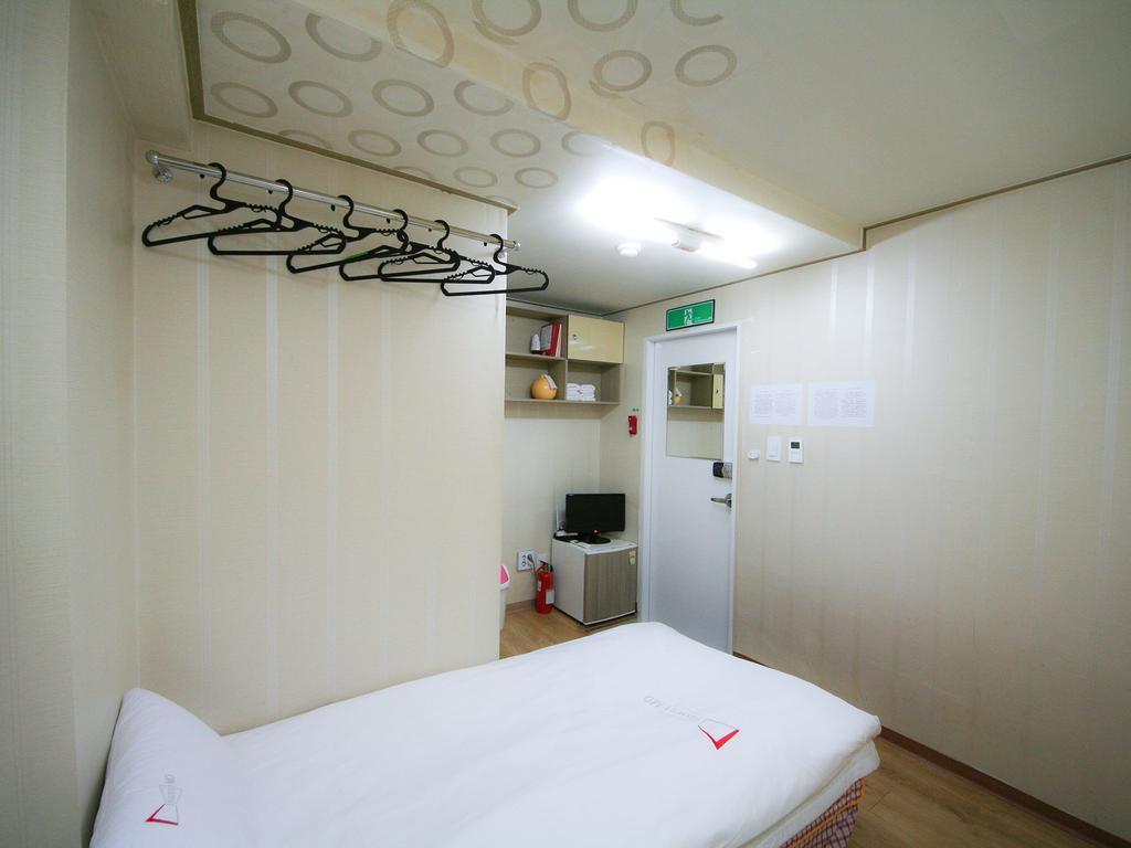 Guesthouse Myeongdong Seul Quarto foto