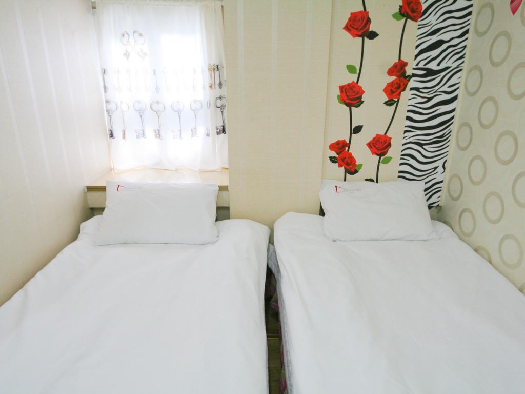 Guesthouse Myeongdong Seul Quarto foto